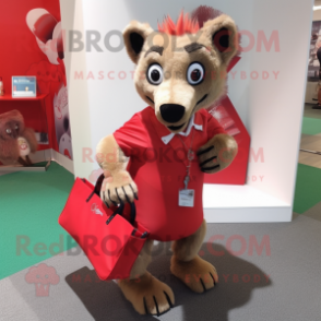 Red Hyena mascot costume character dressed with a Dress Shirt and Tote bags