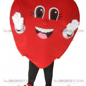 Mascota de corazón de terciopelo rojo muy sonriente -