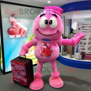 Pink Candy mascot costume character dressed with a Rash Guard and Briefcases