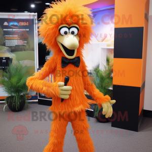 Orange Emu mascot costume character dressed with a Dress Pants and Hairpins