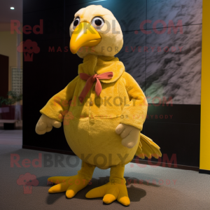 Yellow Guinea Fowl mascot costume character dressed with a Corduroy Pants and Hairpins