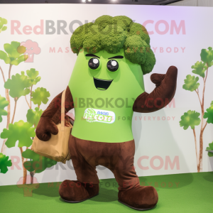Brown Broccoli mascot costume character dressed with a Sweatshirt and Messenger bags