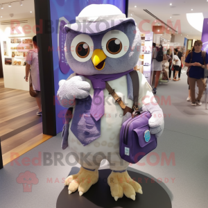 Lavender Owl mascot costume character dressed with a Oxford Shirt and Messenger bags