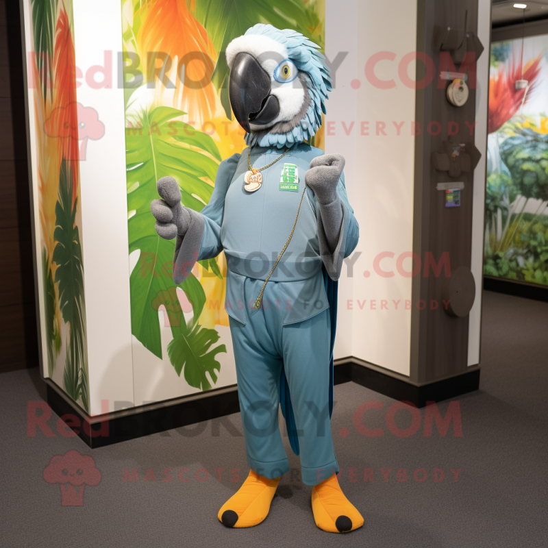 Silver Macaw mascot costume character dressed with a Jumpsuit and Scarf clips Silver Macaw mascot costume character dressed with a Jumpsuit and Scarf clips