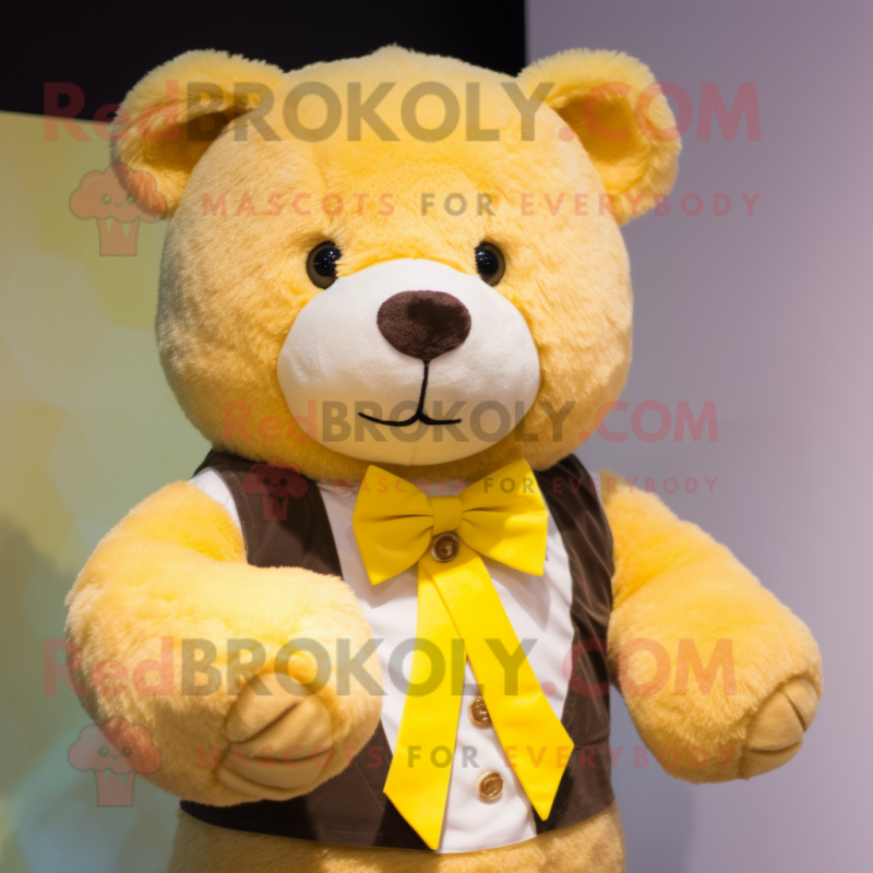 Yellow Teddy Bear mascot costume character dressed with a Vest and Bow ties Yellow Teddy Bear mascot costume character dressed with a Vest and Bow ties