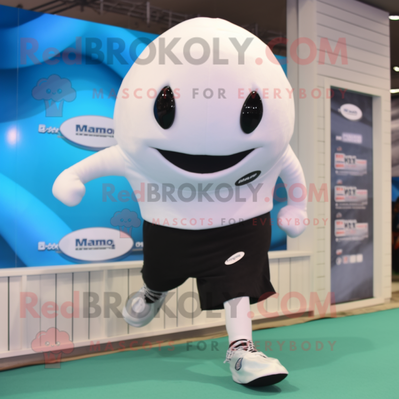Black Beluga Whale mascot costume character dressed with a Running Shorts and Bracelets Black Beluga Whale mascot costume character dressed with a Running Shorts and Bracelets
