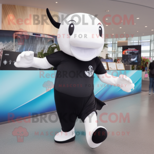 Black Beluga Whale mascot costume character dressed with a Running Shorts and Bracelets