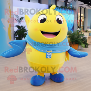 Lemon Yellow Blue Whale mascot costume character dressed with a Sweatshirt and Brooches