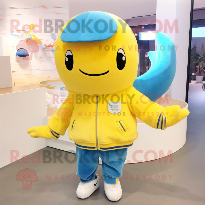 Lemon Yellow Blue Whale mascot costume character dressed with a Sweatshirt and Brooches