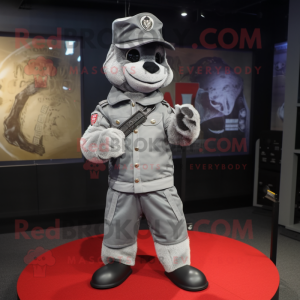 Silver Sniper mascot costume character dressed with a Bomber Jacket and Hat pins