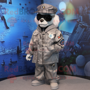 Silver Sniper mascot costume character dressed with a Bomber Jacket and Hat pins