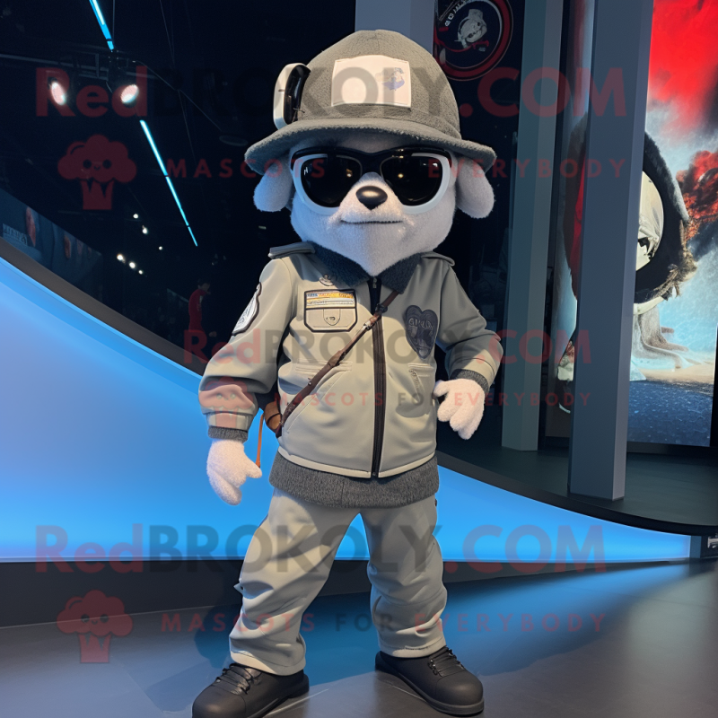 Silver Sniper mascot costume character dressed with a Bomber Jacket and Hat pins