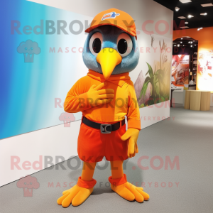 Orange Woodpecker mascot costume character dressed with a Bermuda Shorts and Beanies
