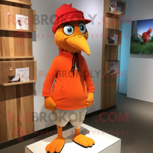 Orange Woodpecker mascot costume character dressed with a Bermuda Shorts and Beanies