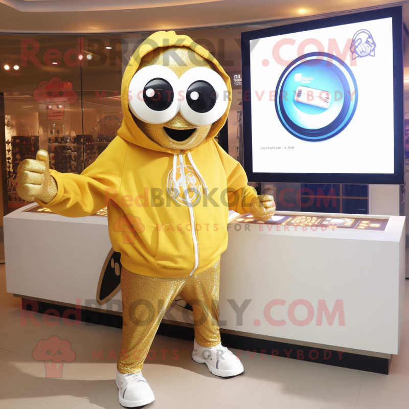 Gold Shakshuka mascot costume character dressed with a Sweatshirt and Digital watches