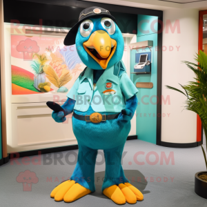 Turquoise Toucan mascot costume character dressed with a Overalls and Tie pins