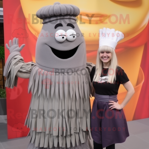 Gray Pesto Pasta mascot costume character dressed with a Pleated Skirt and Berets
