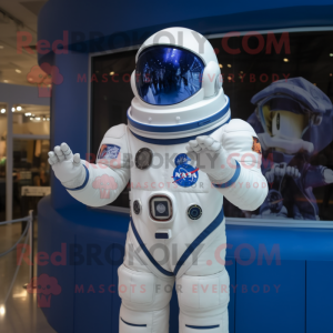 Navy Astronaut mascot costume character dressed with a Rash Guard and Berets