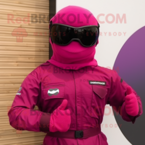 Magenta Para Commando mascot costume character dressed with a Jumpsuit and Sunglasses