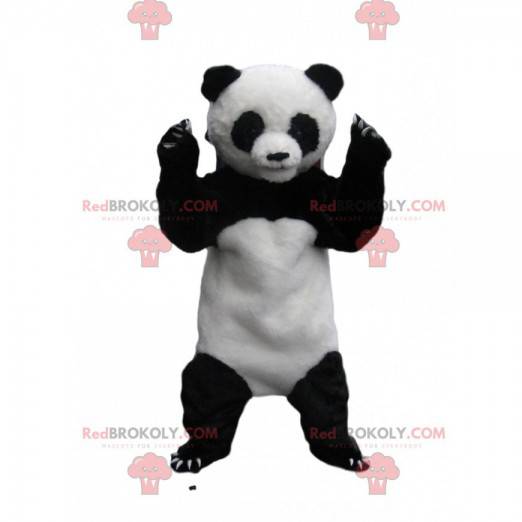 Mascote do panda branco e preto com grandes garras -