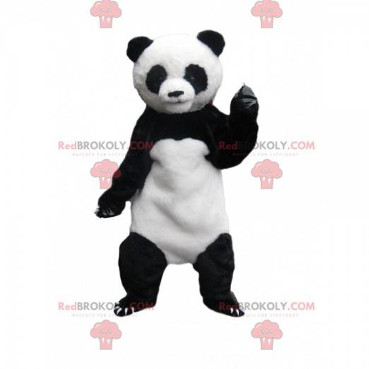 Witte en zwarte panda-mascotte met grote klauwen -