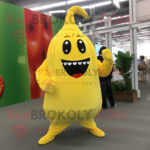 Yellow Pepper mascot costume character dressed with a Jumpsuit and Tie pins