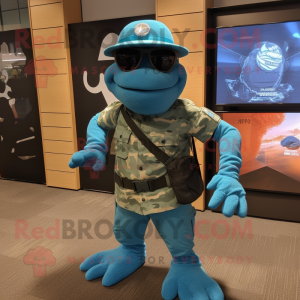 Turquoise Marine Recon mascot costume character dressed with a Graphic Tee and Headbands