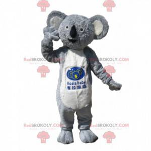 Mascotte koala grigio e bianco con un bellissimo cappotto -