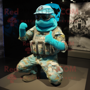 Turquoise Marine Recon mascot costume character dressed with a Graphic Tee and Headbands