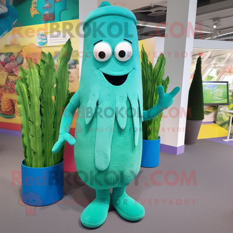 Turquoise Asparagus mascot costume character dressed with a Playsuit and Beanies Turquoise Asparagus mascot costume character dressed with a Playsuit and Beanies