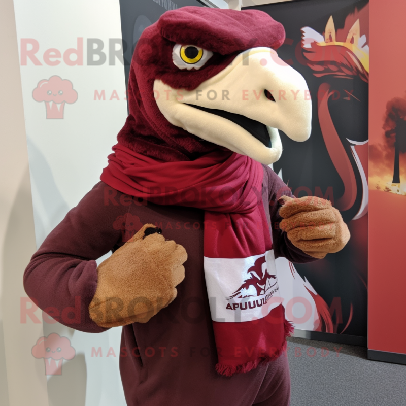 Maroon Utahraptor mascot costume character dressed with a Graphic Tee and Scarves Maroon Utahraptor mascot costume character dressed with a Graphic Tee and Scarves