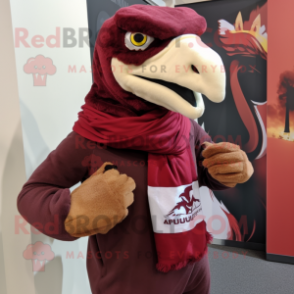 Maroon Utahraptor mascot costume character dressed with a Graphic Tee and Scarves