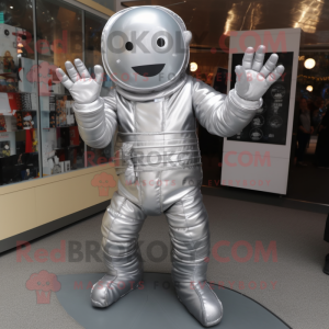 Silver But mascot costume character dressed with a Playsuit and Mittens