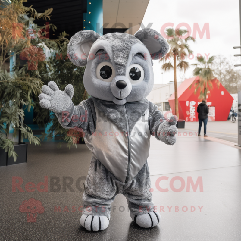 Silver But mascot costume character dressed with a Playsuit and Mittens