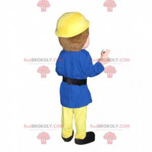 Mascotte dell'operaio di salvataggio con un casco giallo e una