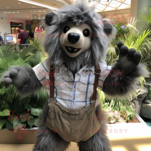 Gray Sloth Bear mascot costume character dressed with a Button-Up Shirt and Shoe clips