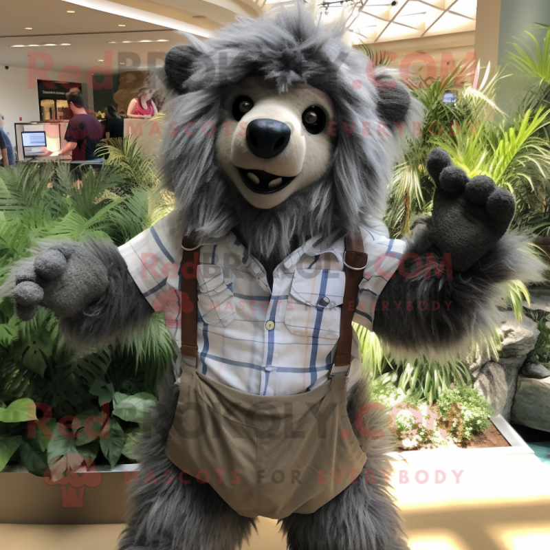 Gray Sloth Bear mascot costume character dressed with a Button-Up Shirt and Shoe clips Gray Sloth Bear mascot costume character dressed with a Button-Up Shirt and Shoe clips
