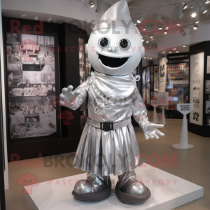Silver Momentum mascot costume character dressed with a Dress and Ties