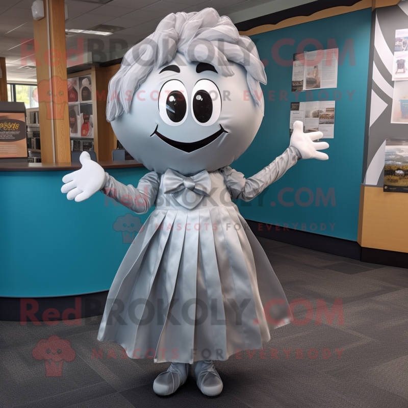 Silver Momentum mascot costume character dressed with a Dress and Ties Silver Momentum mascot costume character dressed with a Dress and Ties