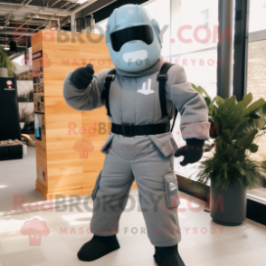 Gray Gi Joe mascot costume character dressed with a Dungarees and Backpacks