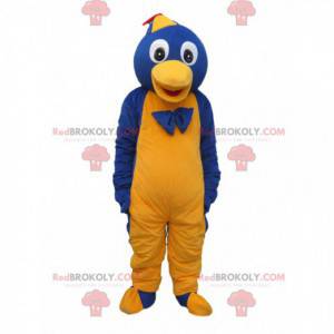 Mascota pingüino azul y amarillo con gorra y lazo -