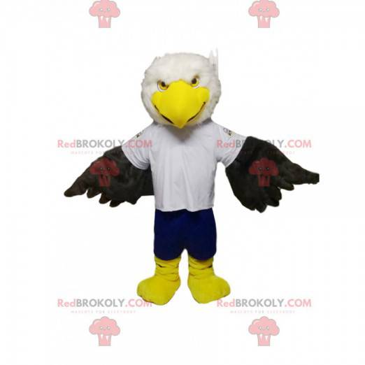 Mascota águila dorada blanca y negra con pantalón azul -