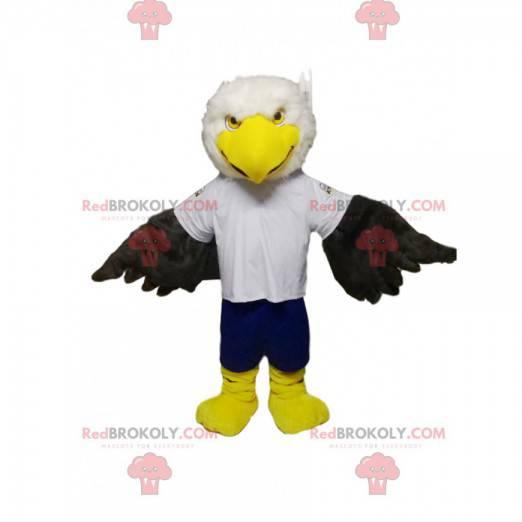 White and black golden eagle mascot with blue shorts -
