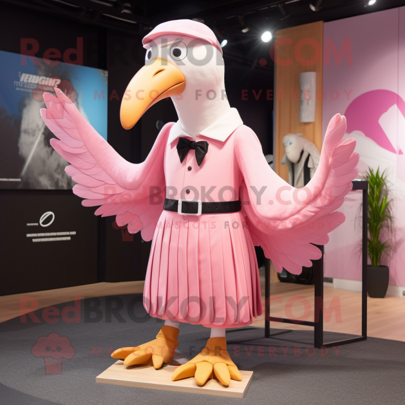 Pink Albatross mascot costume character dressed with a Dress Pants and Hair clips