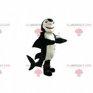 Mascota de tiburón blanco y negro con ojos verdes -