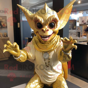 Gold Gargoyle mascot costume character dressed with a Long Sleeve Tee and Keychains