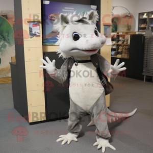 Gray Axolotls mascot costume character dressed with a Vest and Shoe clips