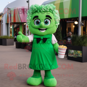 Green Pop Corn mascot costume character dressed with a Blouse and Mittens