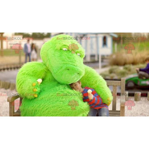 Monstro verde dinossauro mascote dragão - Redbrokoly.com