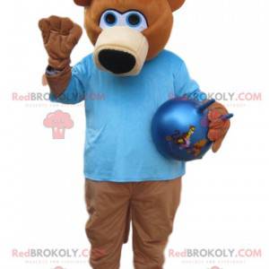 Maskotka niedźwiedź brunatny z niebieskiej koszulki -